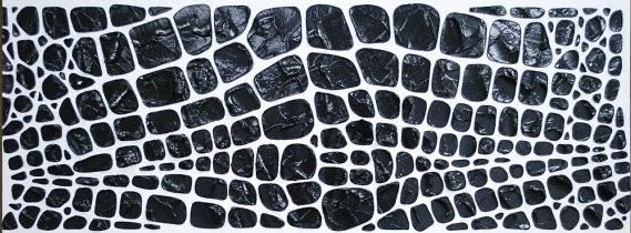 Detailed view of black and white mosaic artwork with irregular stones, contemporary abstract wall decor