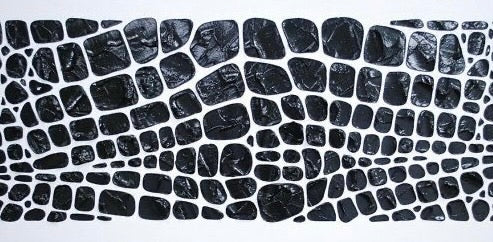 Large black and white mosaic wall art with irregular stone shapes, modern abstract decor for living space